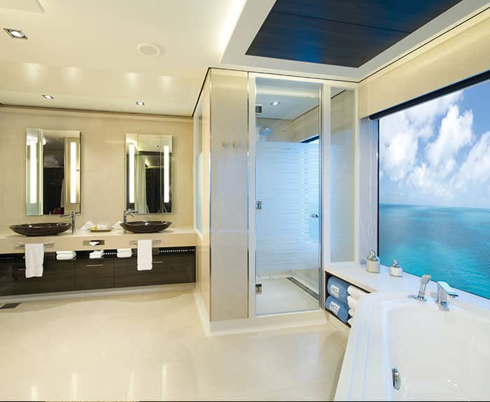 The Haven's Deluxe Owners Suite with Large Balcony Bathroom on Norwegian Getaway