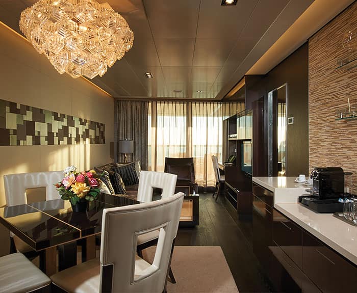 The Haven's Owners Suite with Large Balcony Living Room on Norwegian Escape